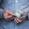 Businessman holding money in his hands