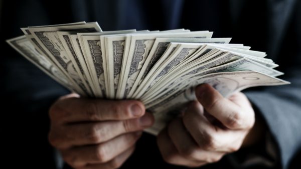 Closeup of hands holding cash