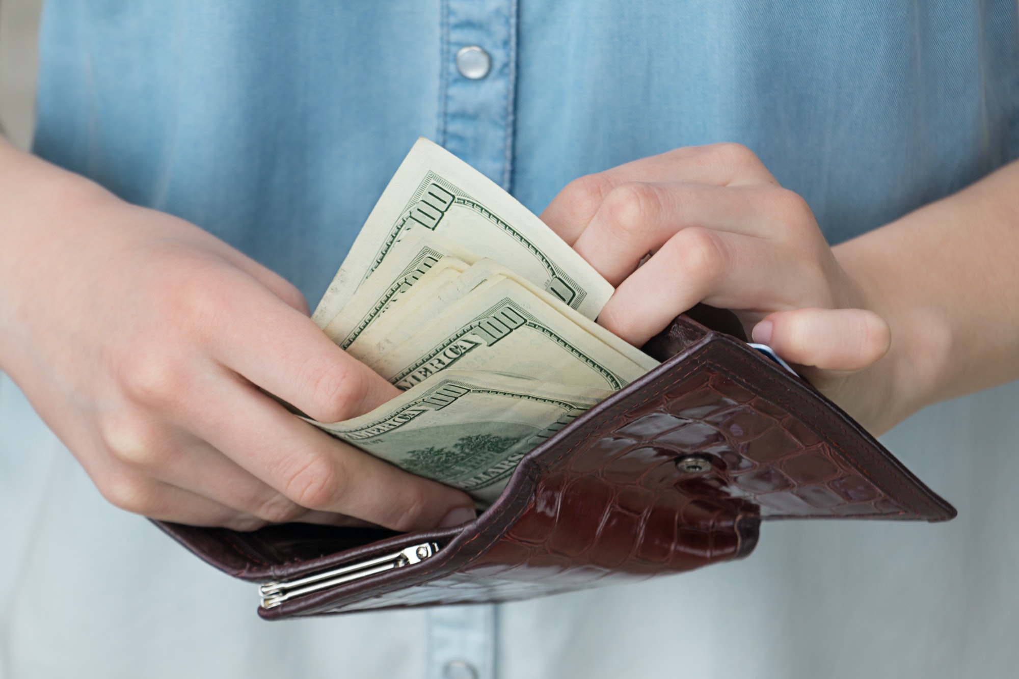 A girl with a wallet in her hands, business, savings, investment, paper, banking, financial, bank, h