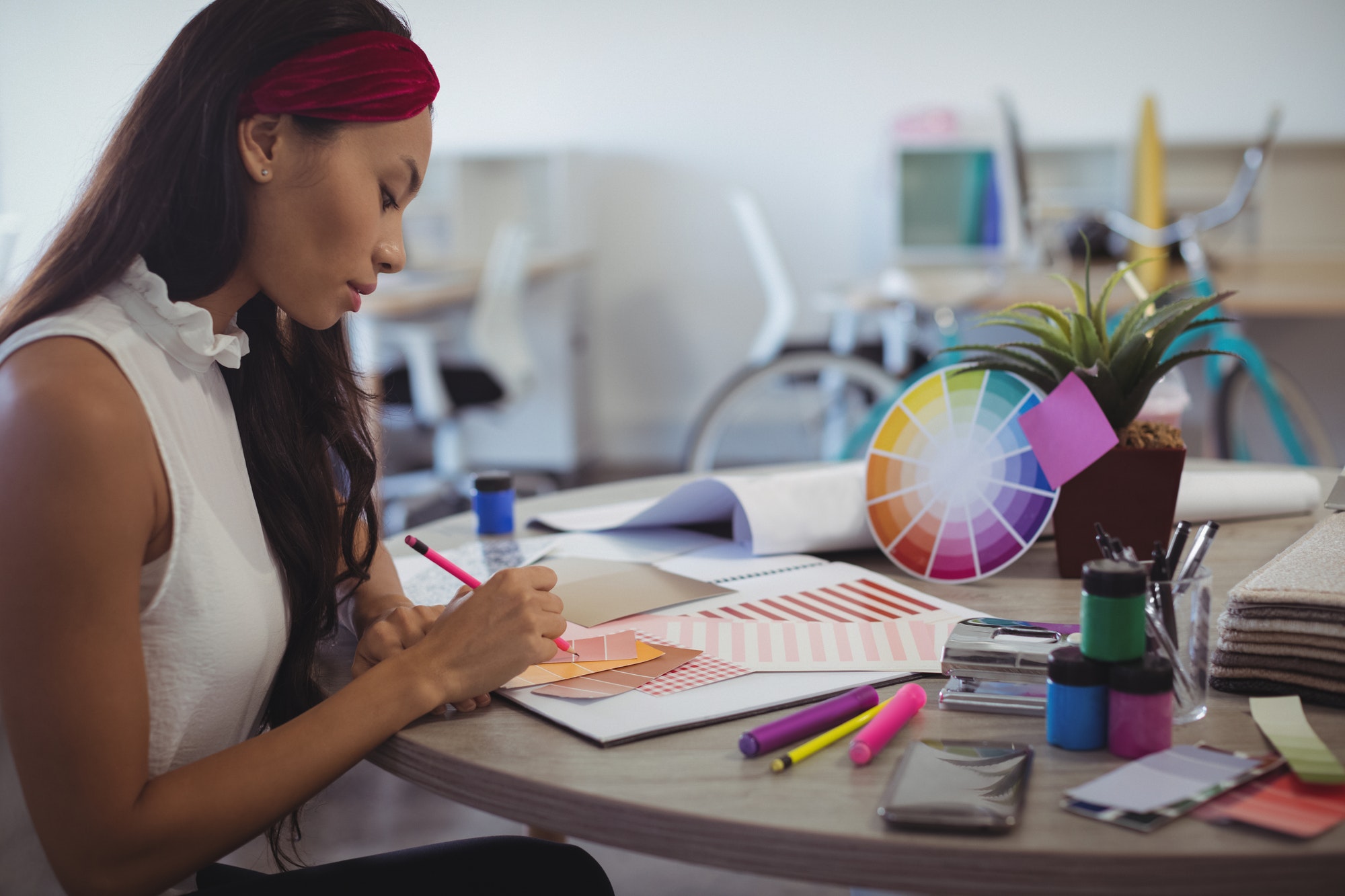 Side view of entrepreneur in creative office