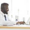 Side view of young customer service agent working in office