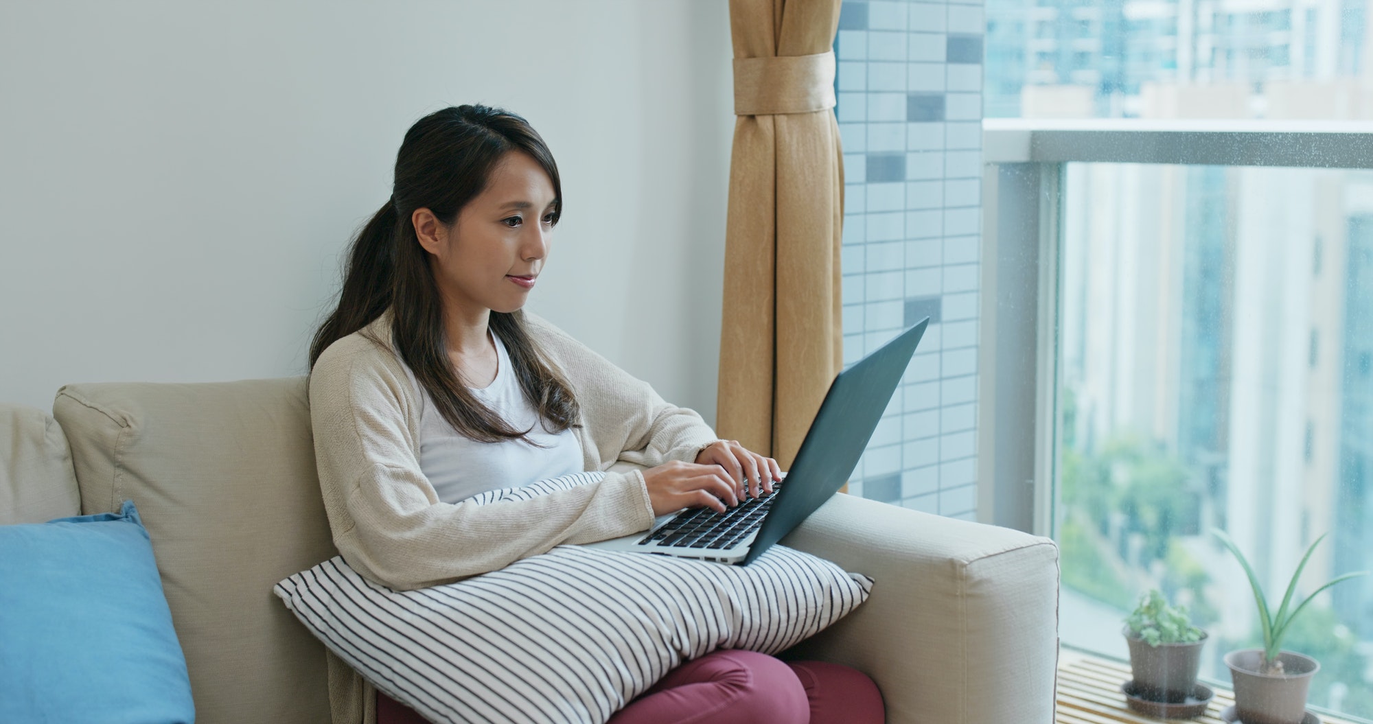 Woman work on computer at home